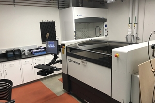 laser cutting machine in room.